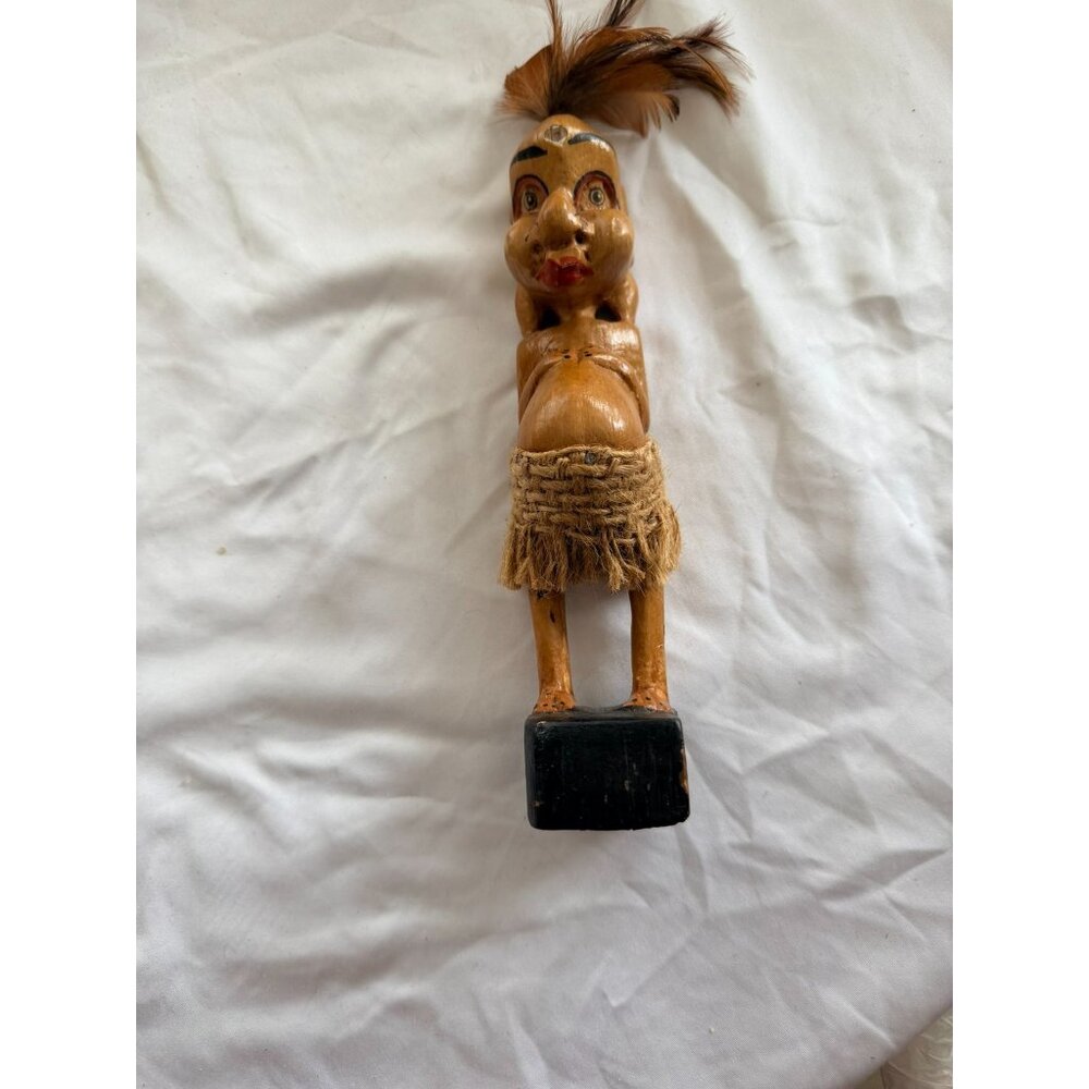 Hand-Carved Wooden Tribal Figurine With Feather Accent & Woven Skirt